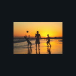 Impressão Em Tela Sunset Beach Soccer Silhouette<br><div class="desc">This captivating photograph features the silhouettes of three young men playing soccer on a Brazilian beach as the sun dips below the horizon. Taken at Praia da Paciência in the Ondina neighborhood, the image perfectly encapsulates the vibrant culture and athletic spirit of Salvador. The golden hour light creates a high-contrast...</div>