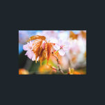 Impressão Em Tela Uma Charmante Flor Sakura Em Um Pau De Primavera<br><div class="desc">Uma encantadora flor de sakura rosa-macia em um galho de árvore. Folhas de laranja e balanças de botões. O fundo multicolorido liso das cerejeiras floridas. Uma pintura digital muito grande a partir de uma fotografia. Impressão floral esticada de tela para decorar seu lugar ou para ser usada como presente em...</div>