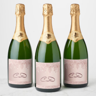 Iniciais de monograma cor-de-rosa com rosa de-ouro