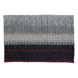 Lã de tricô: listras brancas e vermelhas.