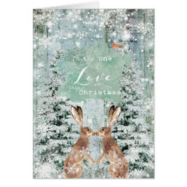 Lebres da neve do inverno do Natal um cartão do
