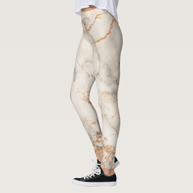 Legging Acentos Castanhos e Padrão Abstrato Branco (Esquerda)