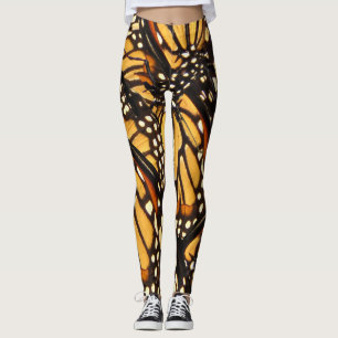 Legging Caneleiras pretas alaranjadas do abstrato da