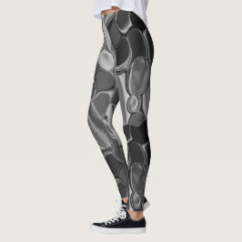 Legging Cinzas claras e formas arredondadas escuras.