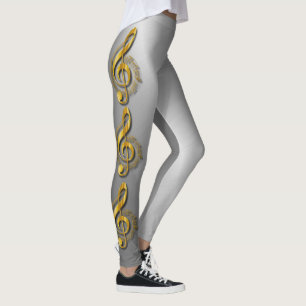 Legging Clef de triplo dourado com notas e sombras
