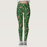 Legging Equipamento de golfe<br><div class="desc">O teste padrão das bolas de golfe, os clubes de golfe, as bolsas de golfe, as camisetas e as bandeiras nestas caneleiras verdes são presente perfeito para um jogador de golfe!</div>