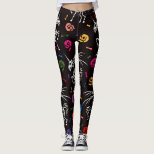 Legging Esqueleto Pegasus: padrão de crânios coloridos.