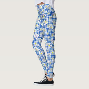 Legging Flores brancas de camomila em um fundo azul-contro