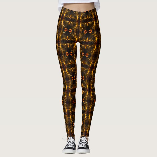 Legging Formas, 'traços dourados flutuam' em fundo escuro. (Frente)