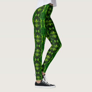 Legging Formas, "vestígios verdes flutuam" em fundo escuro