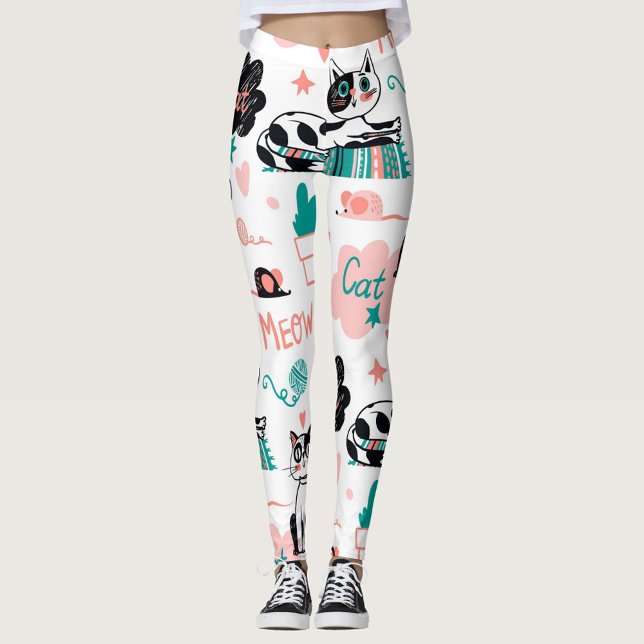 Legging Gatos (Colorful cat-themed leggings against a neutral background.  )