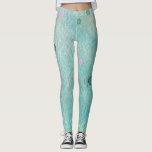 Legging Impressão de pintura roxa de cor verde-claro<br><div class="desc">Um design de estilo aquarela com alguns toques de pintura,  dá a estas leggings e aparência artística. Apresenta um fundo cor de rosa claro e calmo,  com saltos em verde escuro e roxo de orquídea.</div>