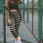 Legging Impressão de Sage Green Zebra<br><div class="desc">Estas leggings de impressão zebra são desenhadas com uma reviravolta cativante, com faixas de zebra verdes em sábado que acrescentam um toque ousado e vibrante ao padrão clássico de zebra. A combinação única do padrão tradicional da zebra com a matiz impressionante Sage Green cria um olhar impressionante e atraente que...</div>