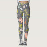 Legging Leggens de Verde limão e Impressão de carvão<br><div class="desc">O combo de cores moderno nestas leggings de impressão combinado com o padrão botânico e florado,  certamente vira algumas cabeças. Estas leggings possuem uma cinza de carvão com um impressão brilhante e ousado,  de cor rosa-coral,  verde limão,  azul-claro e branco,  representando folhas e flores.</div>