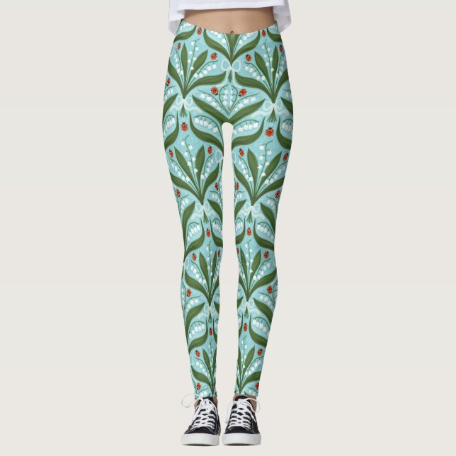 Legging Lily do vale e a simetria de joias em verde. (Frente)