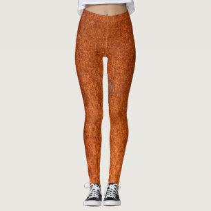 Legging Metais maleados: textura vermelha alaranjada.