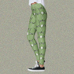 Legging Moldes de tacos de golfe<br><div class="desc">Pernas moldadas divertidas em uma cor verde lisonjeira e lisonjeira para um golfista afiado. O padrão repetitivo é criado por tacos de golfe cruzados e bolas de golfe,  em fundo verde.</div>