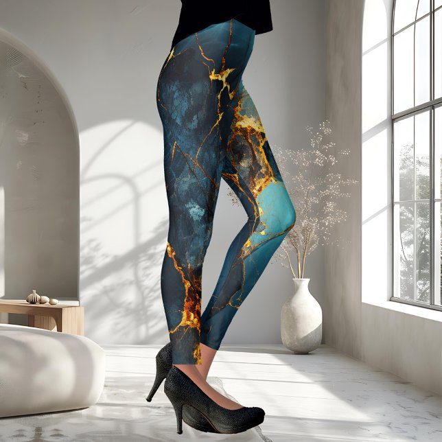 Legging Ocher Abstrato Azul de Artística Veada (Leggings featuring an abstract veined design in teal blue and warm ocher.)