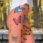 Legging Padrão Colorido de Borboletas Rosa Salmão<br><div class="desc">Estilo Gracioso, Conforto Negrito: Adicione uma flauta ao seu dia com estas leggings de Borboleta! Apresentando um design colorido e atraente, eles oferecem beleza e conforto para todas as ocasiões. Quer estejam a deitar-se ou a deslocar-se, estas leggings vão levar a vossa vista para o próximo nível. Pegue o seu...</div>