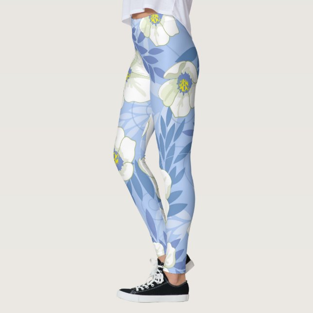 Legging Padrão de Flores Brancas com Fundo Azul e Folhas F (Esquerda)