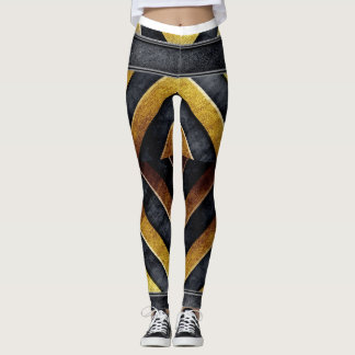 Legging padrão geométrico preto e dourado