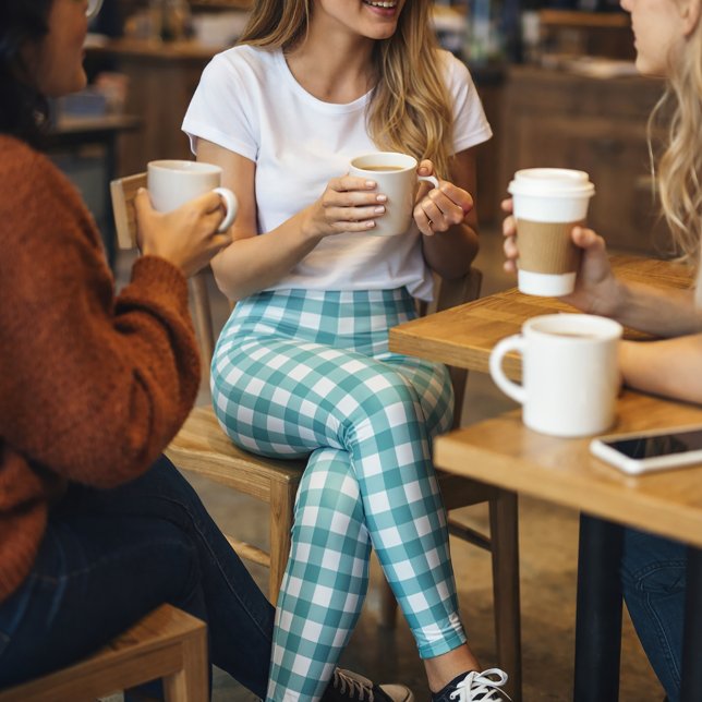 Legging Padrão Xadrez Ginga Azul e Branco (A pair of leggings with a teal and white gingham plaid pattern.)
