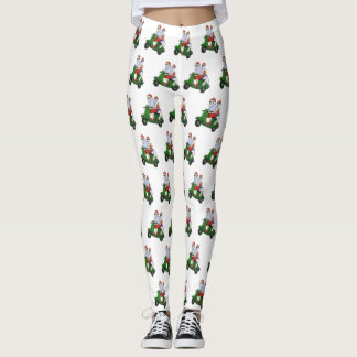 Legging Papais noeis e Sra. Claus andando em patinete