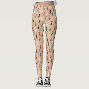 Legging rosa do teste padrão dos gatos
