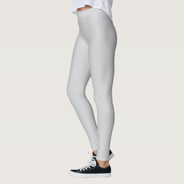 Legging Um close-up de uma superfície texturizada branca e (Esquerda)