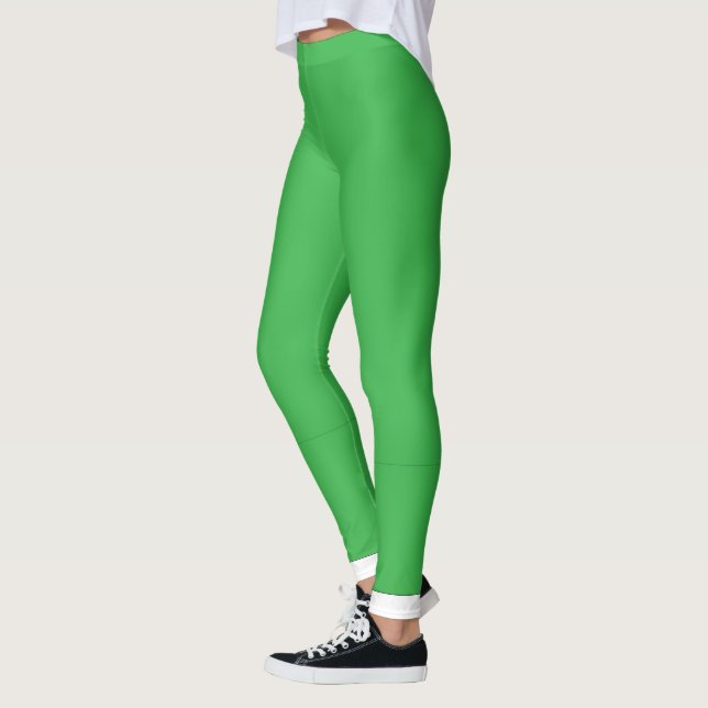Legging um fundo verde com borda branca (Esquerda)