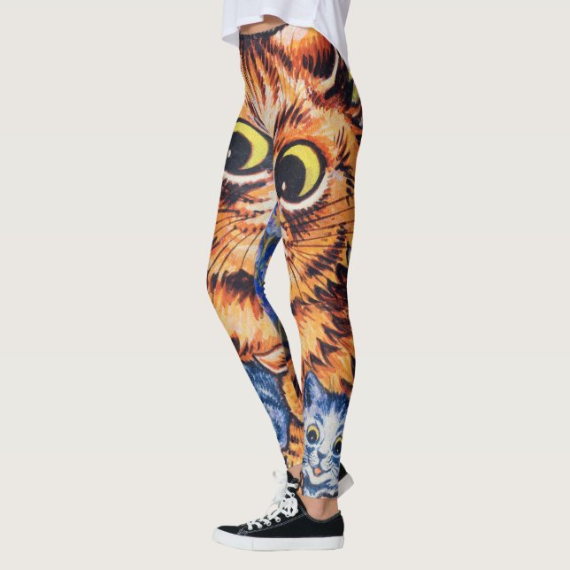 Legging Um gato com seus filhotes por Louis Wain (Esquerda)