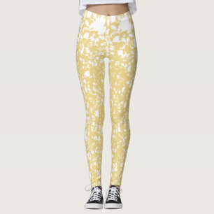 Legging Um tapete amarelo com um padrão repetitivo de moti