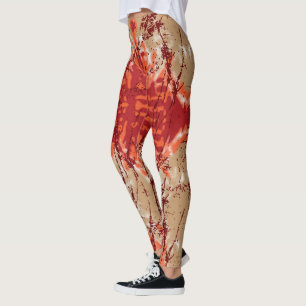 Legging Um tecido que mostra um padrão laranja e castanho,