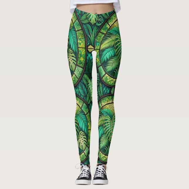 Leggings featuring a vibrant green tropical leaf  (Frente)