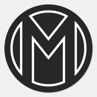 Letra M no círculo do adesivo preto