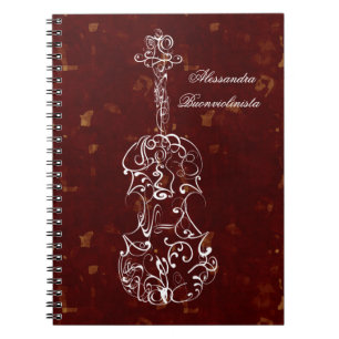Linha branca violino no caderno espiral vermelho