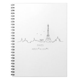 Linha do horizonte de Paris com caderno de coorden