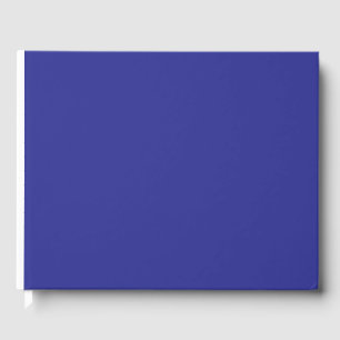 Livro De Visitas uma parede azul com um relógio