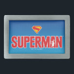 Logotipo clássico do Super-Homem<br><div class="desc">Traga a energia do super-herói eterno ao seu estilo com este design impressionante do Super-Homem! Apresentando o ousado texto vermelho "SUPERMAN" com uma silhueta do Homem de Aço postada heroicamente dentro da letra, esta trabalho de arte pop contra um elegante fundo azul gradiente. Com o icônico escudo "S" vermelho e...</div>