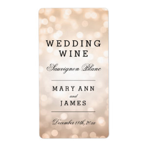 Luzes do brilho do cobre da etiqueta do vinho do