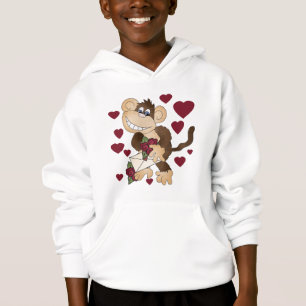 Macaco com camiseta e presentes das rosas