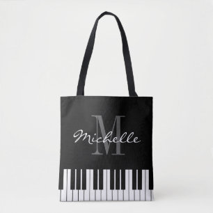 Macaco preto de piano com tote para músico