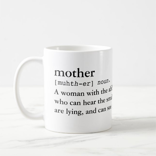 Mãe… Definição de uma caneca engraçada da mamã (Esquerda)