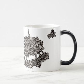 Mágica aranha e a caneca da mosca