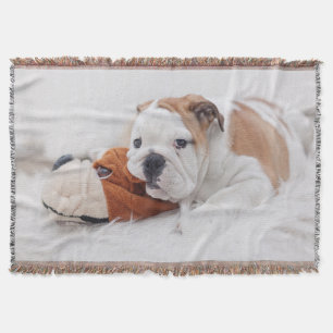 Manta Um filhote de cachorro inglês do buldogue que jog
