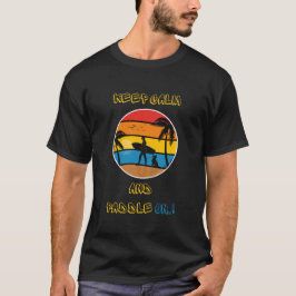 Mantenha a calma e pá na design de camiseta para s