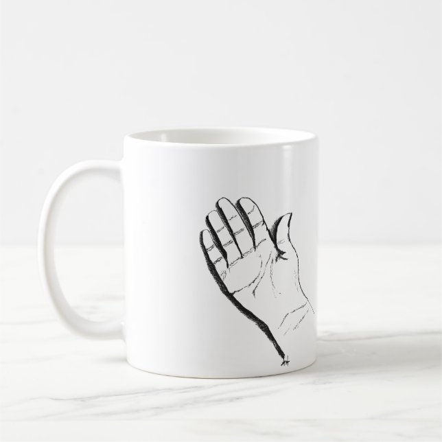 mão preta e branca em caneca de café (Esquerda)
