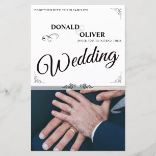 Mãos de um Casal de Casamento Gay com Anéis