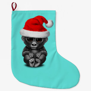 Meia De Natal Grande Gorila do bebê que veste um chapéu do papai noel