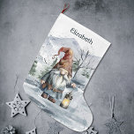 Meia De Natal Grande Watercolor Winter Christmas Gnomo Personalizado<br><div class="desc">Adicione um toque festivo ao manto de lareira nesta temporada de férias com um Gnome personalizado de Natal Watercolor. O design de estoque apresenta um alegre gnomo de Natal segurando uma lanterna iluminada com um fundo de floresta de montanha com queda de neve com um espaço que você pode adicionar...</div>